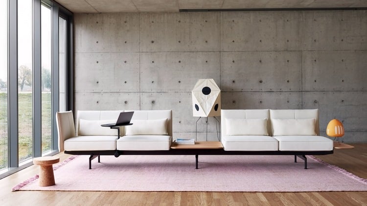 modernes büromöbel design neue trends ersetzen klassiker zeitgenössische arbeitsumgebung arbeitsplatz einrichtung sofa betonwand teppich