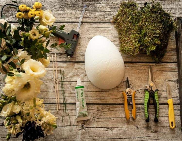 Osterdeko basteln mit Naturmaterialien Blumen und Styropor Ei