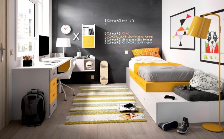 Jungenzimmer in Weiß Gelb und Schwarz mit Bett und Schreibtisch
