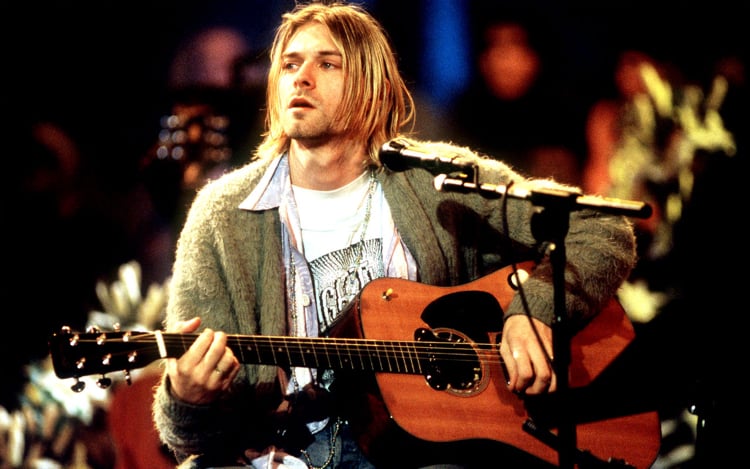 Kurt Cobain mit seiner Gitarre Grundge Ikone