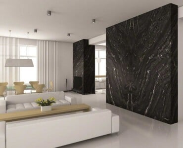 wand akzente aus schwarzem granit in weiß gestaltetem wohnzimmer
