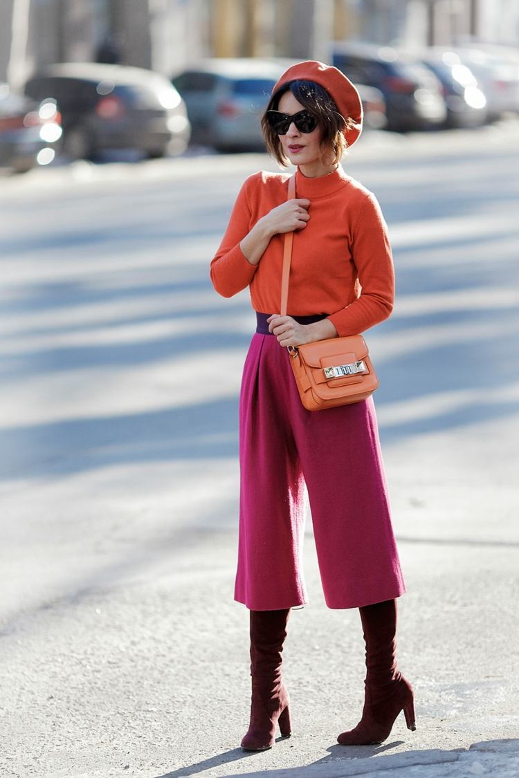 Culotte kombinieren orange Pullover Damenhut Stiefel High Heels Handtasche Modetrends