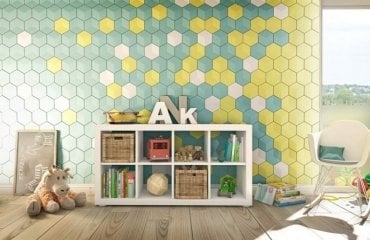Hexagon Wandgestaltung in Grün und Gelb als Deko in einem Kinderzimmer
