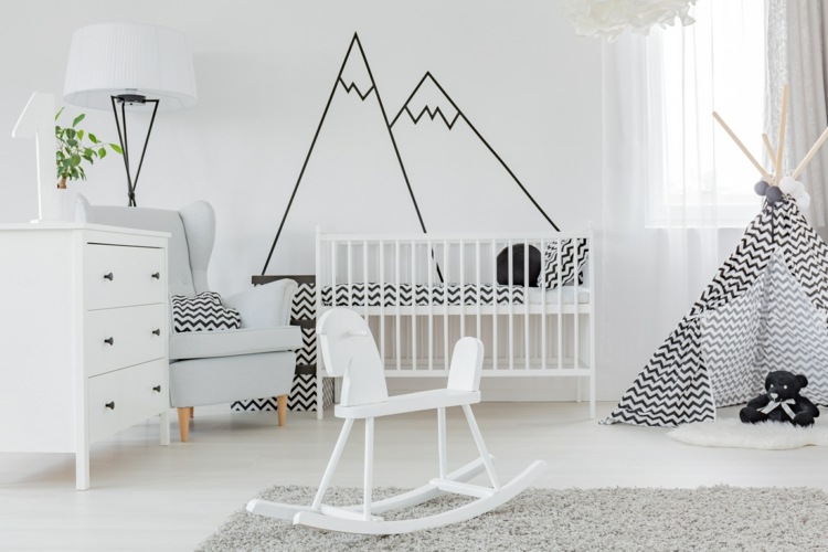 Montessori Babyzimmer in Grau und Weiß mit geometrischer Dekoration