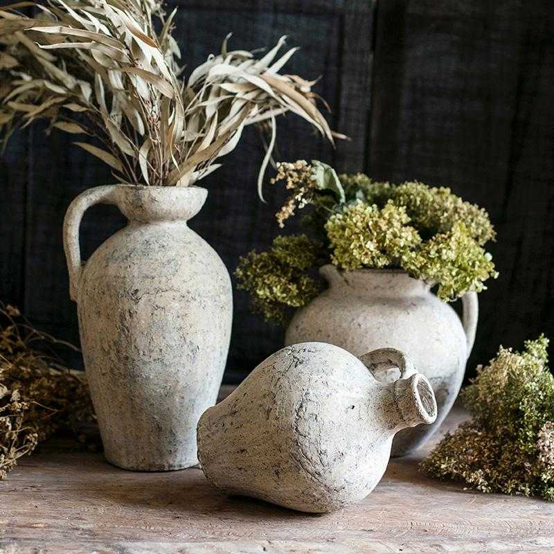 Amphore bepflanzen trockene Pflanzen Vase Winter