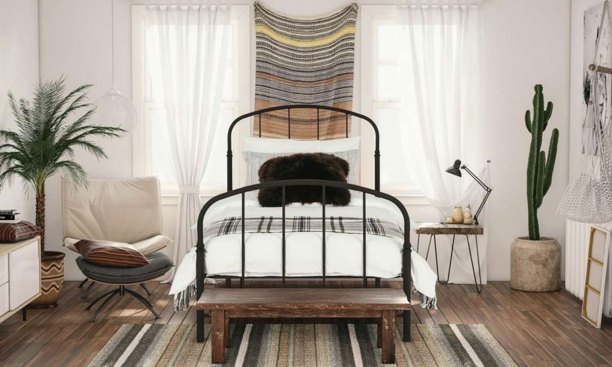 Kleines Schlafzimmer für eine Person mit Bett aus Metall und Parkett