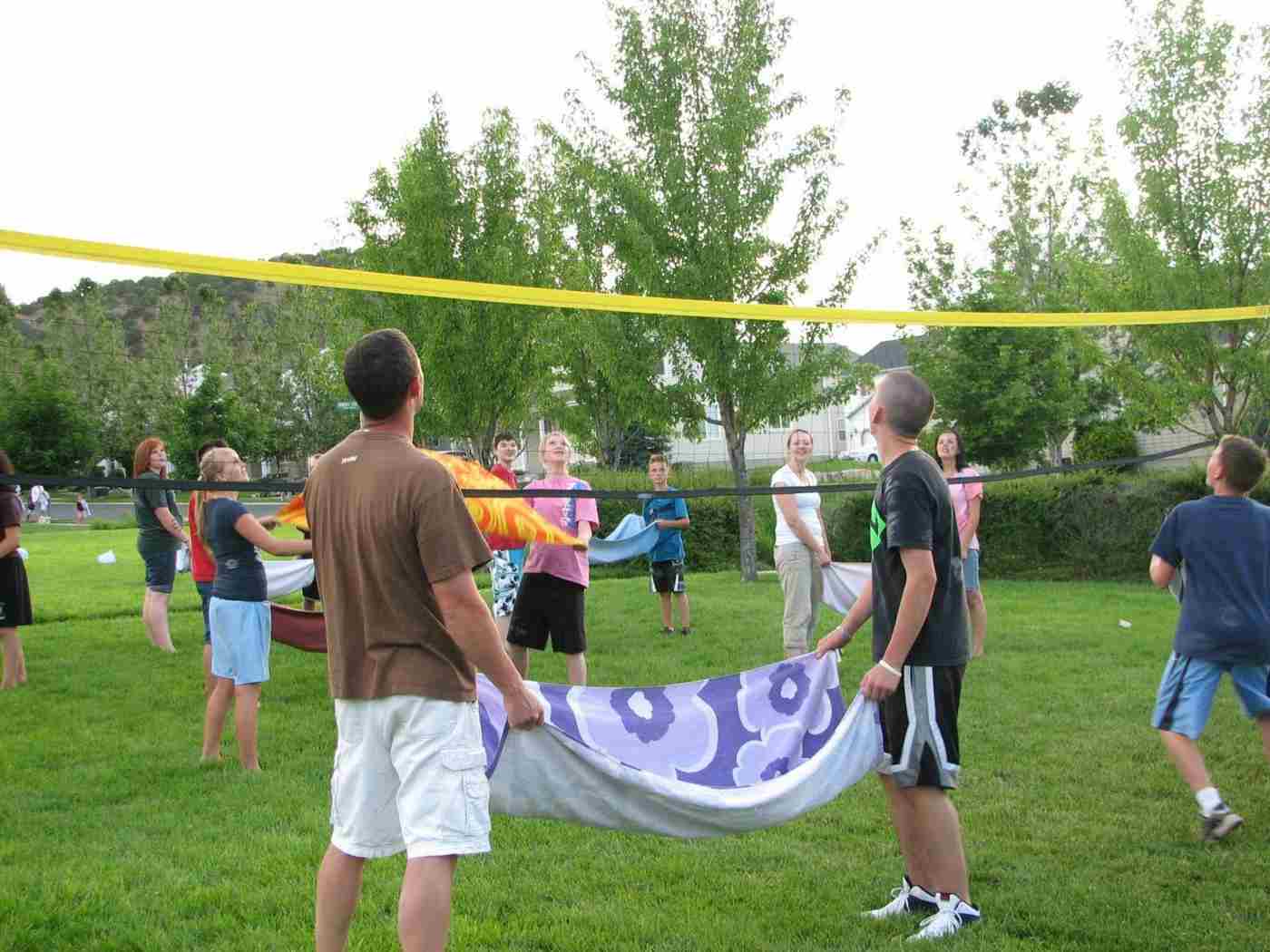 Idea for a volleyball game with water bombs and hand tools