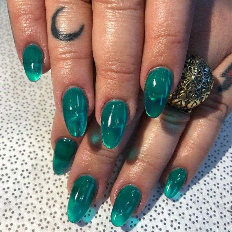 Jelly Nails Nail in almond shape long turquoise Nail polish Nail trends Finger tattoo