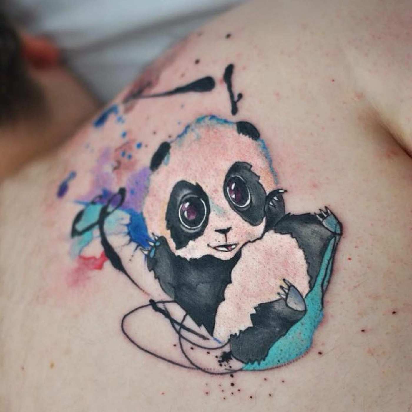 Lower Panda Tattoo with Comic and Watercolor effect in cold colors