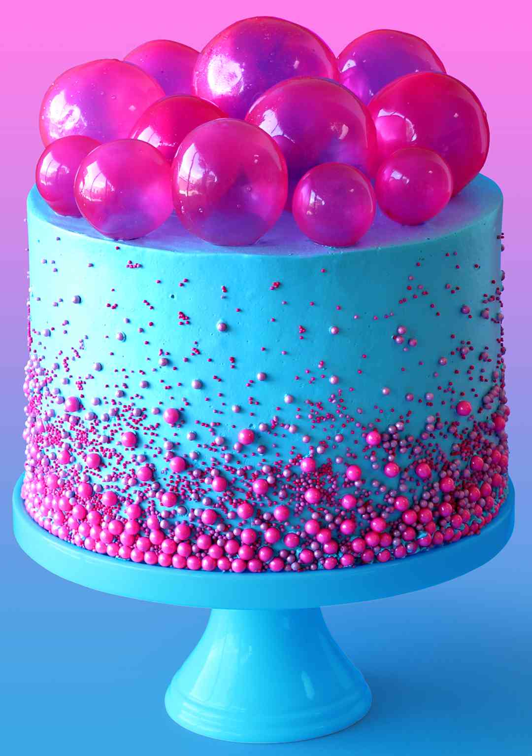 Original torte with blue glaze and pink balls, streuseln and bubbles