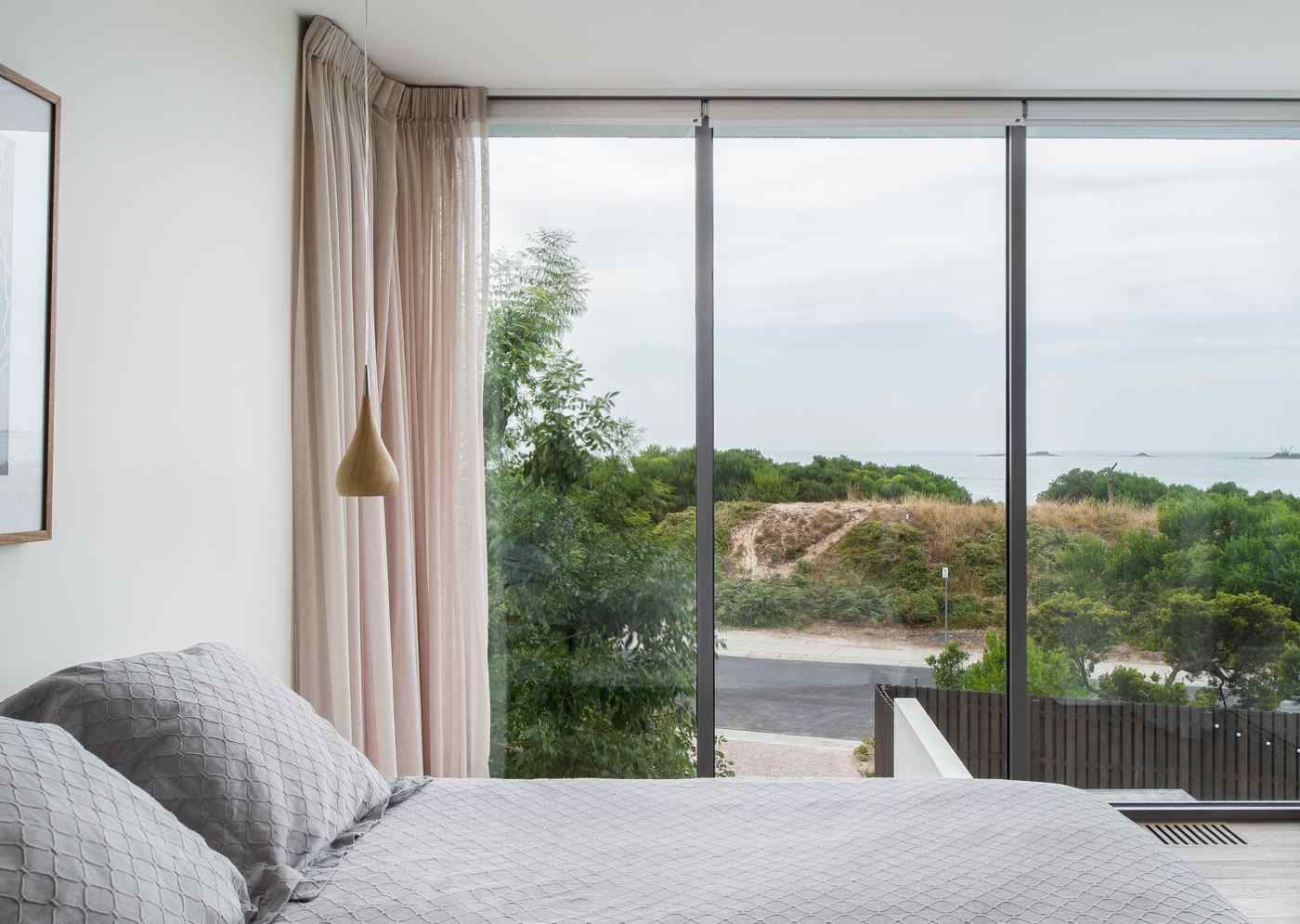 Slimmer with glass front pink curtains look on sand dunes