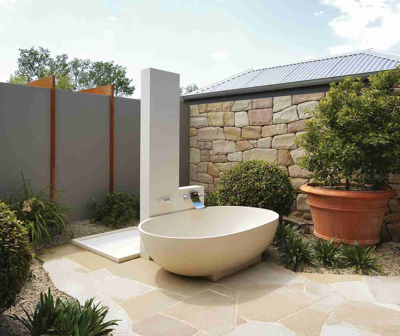 Outdoor shower terrace country house style natural stone