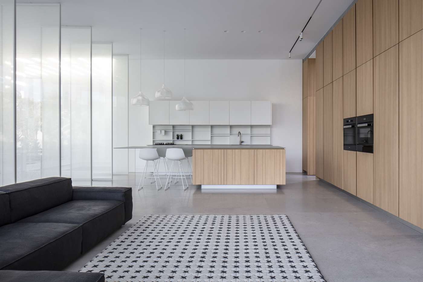 Wood kitchen living room anthracite gray carpet sofa concrete floor