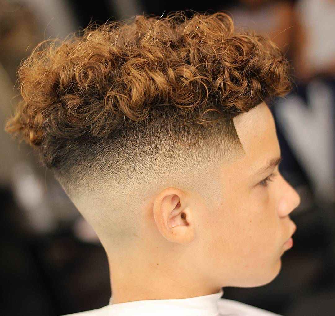 Children's hairstyles Boy with Locken Undercut shave side up long