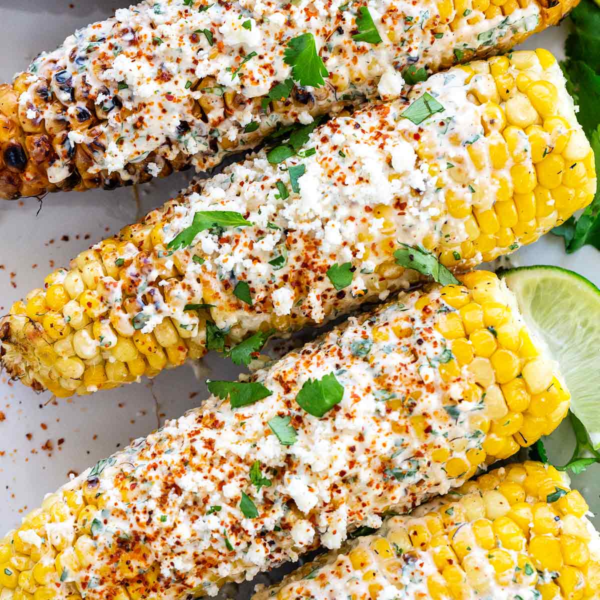 Mais grillen einfach Käsesauce Elote Rezept mexikanische Gerichte Sommer Abendessen