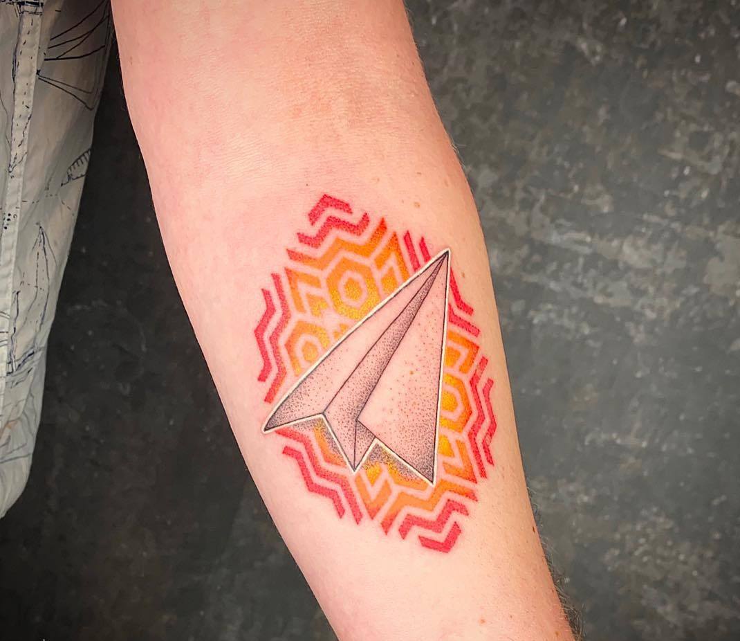 Paper plane tattoo men symbol geometric motifs