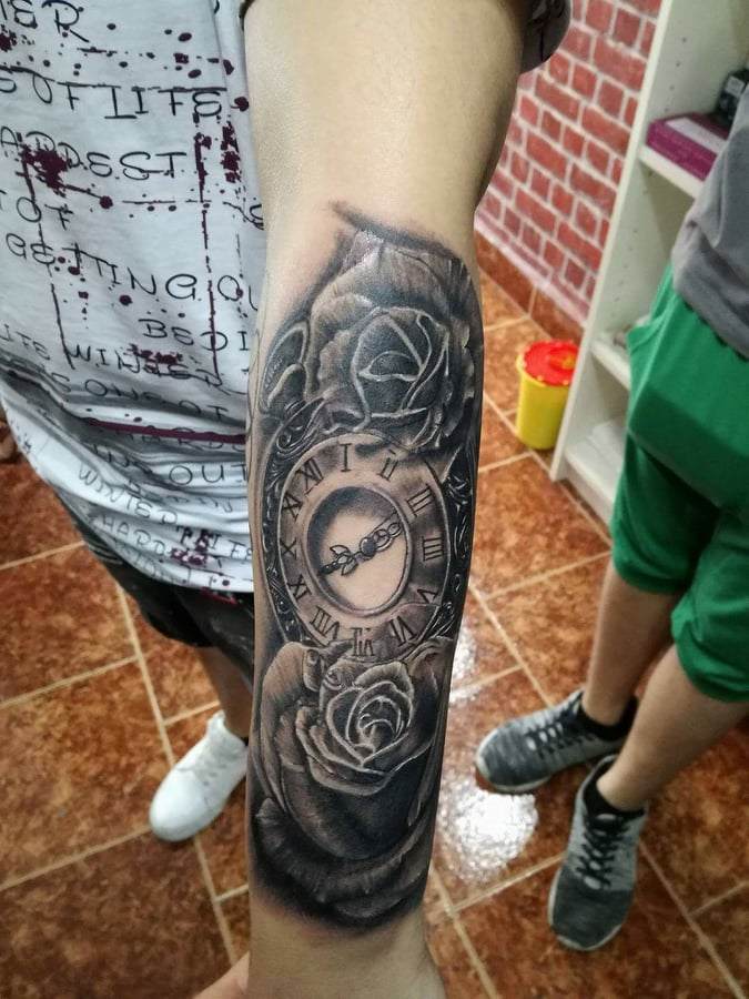 Watch with rose tattoo design forearm tattoo trends motif black and white
