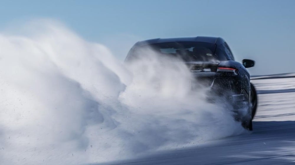 driving behavior of new porsche taycan in snow test driver