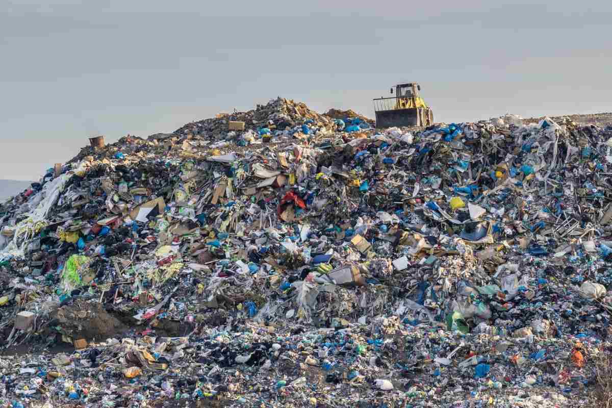 large garbage dump with plastic garbage dumps damages the environment and pollutes soil and air