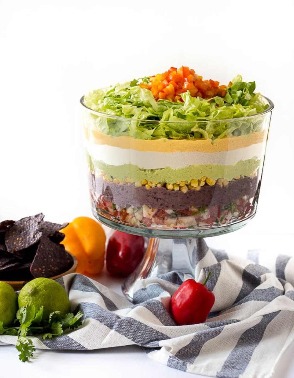 large bowl of Mexican layer salad for vegetarian gluten-free