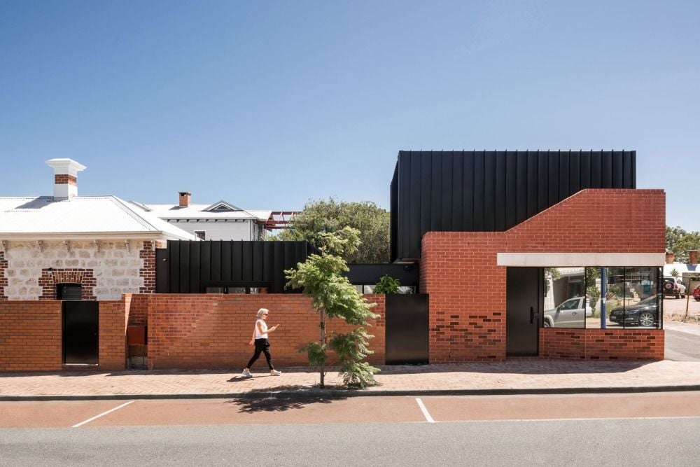 house extension modern single-family house from old working house house brick wall