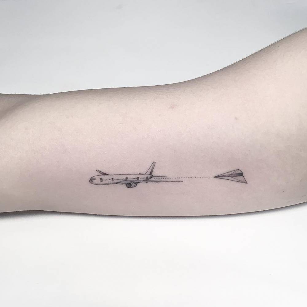 small tattoos men paper airplane airplane meaning