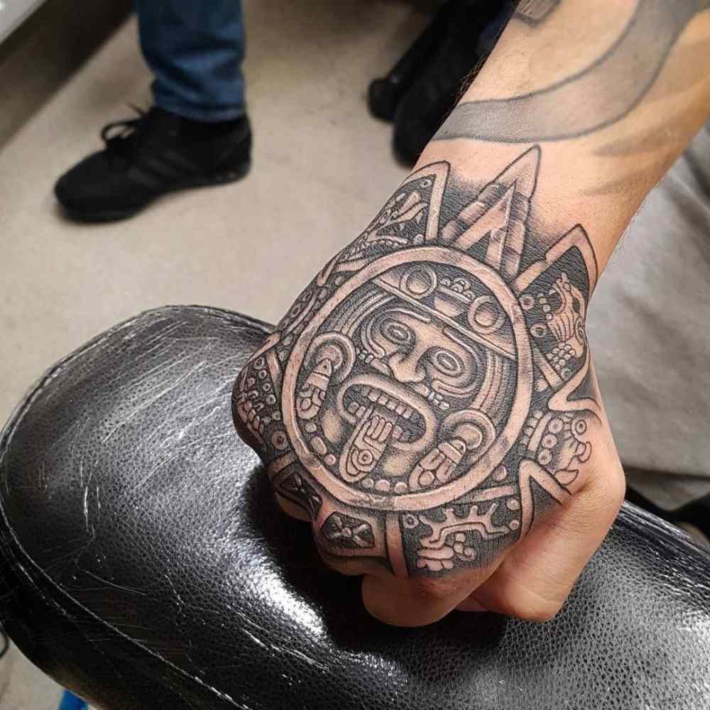 Mayan calendar on the wrist symbolism and meaning with black tint