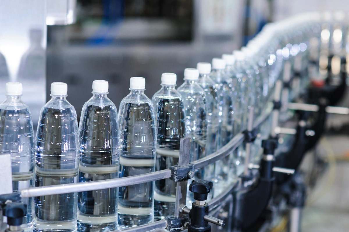 with washer filled plastic bottles in production