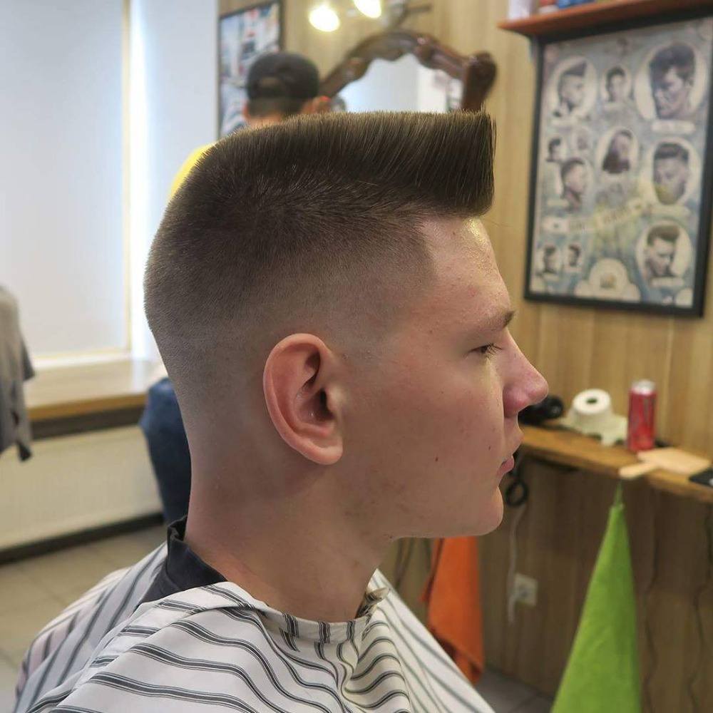 stylish flat top men's hairstyle with short sides and flat top of the head