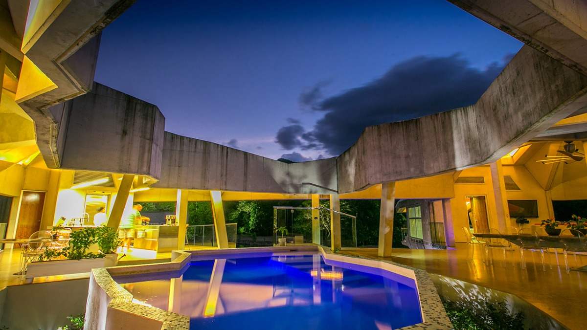swimming pool under free sky in stamp house with exquisite concrete design