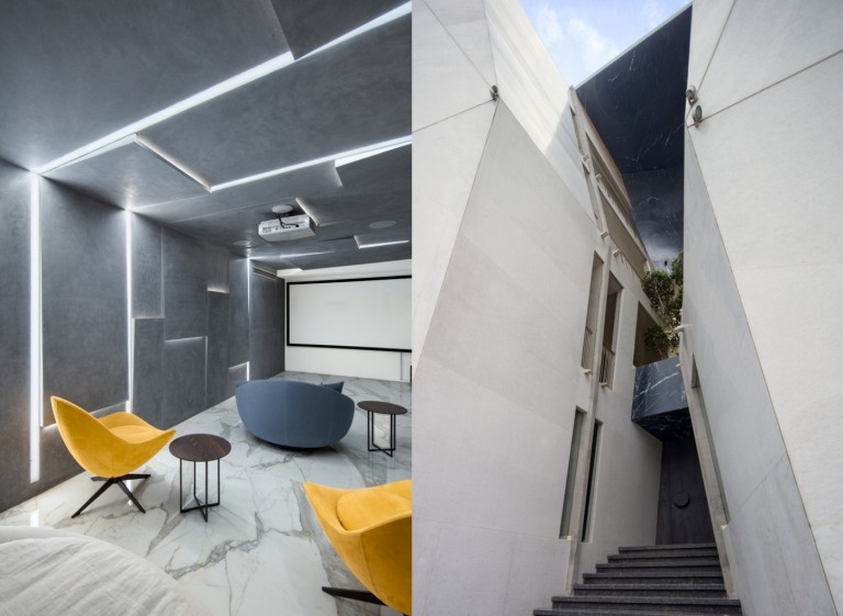 Atriumhaus Fassade in Naturstein verkleidet und Räume mit Marmorboden mit grauen Wänden und LED-Beleuchtung