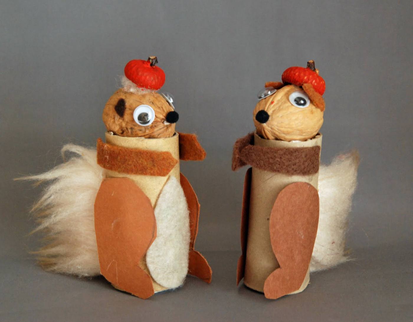 Squirrels made of knocked paper rolls and nuts and felt make fun decoration for home cooking with the children