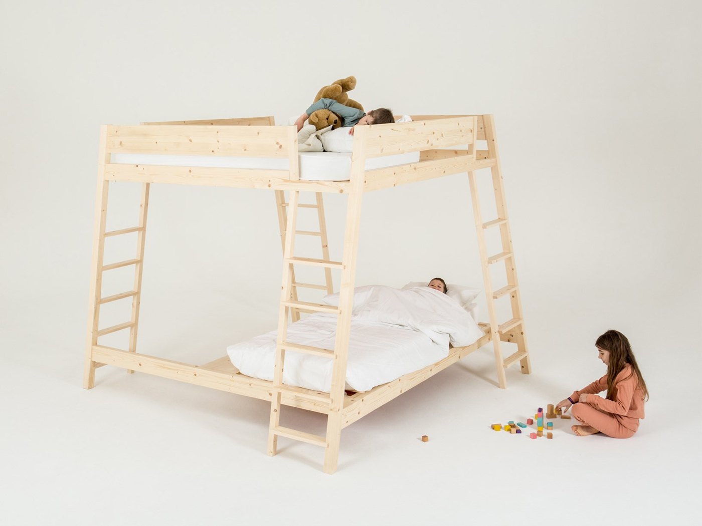 Bunk bed with sleeping possibility on the first floor and further bed on top of the modern children's room