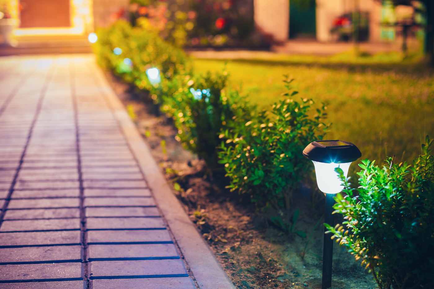 Lighting with motion detectors in the garden saves power led lamps for the garden path