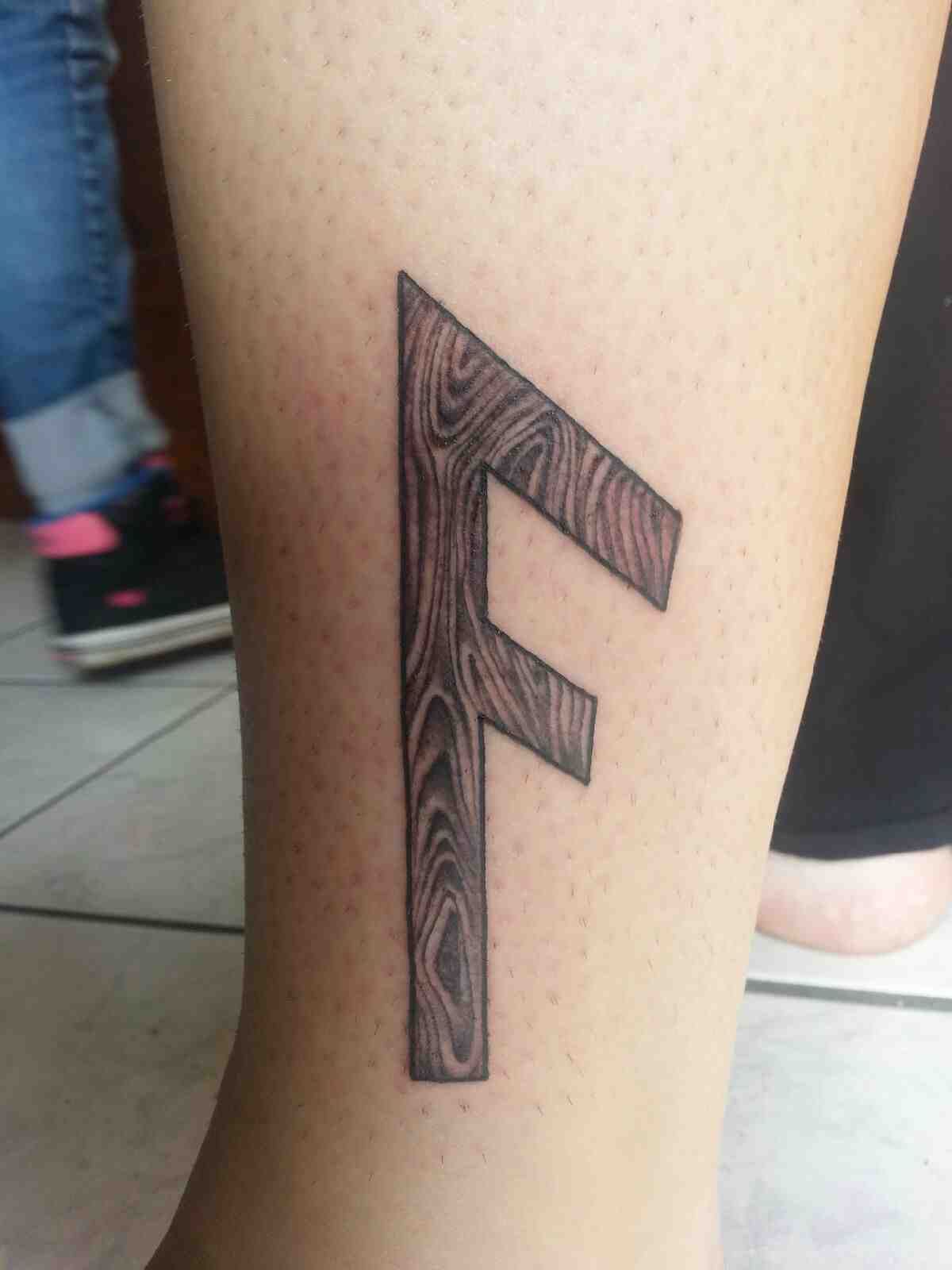 Viking runes tattoos Ansuz tattoo on the leg for men