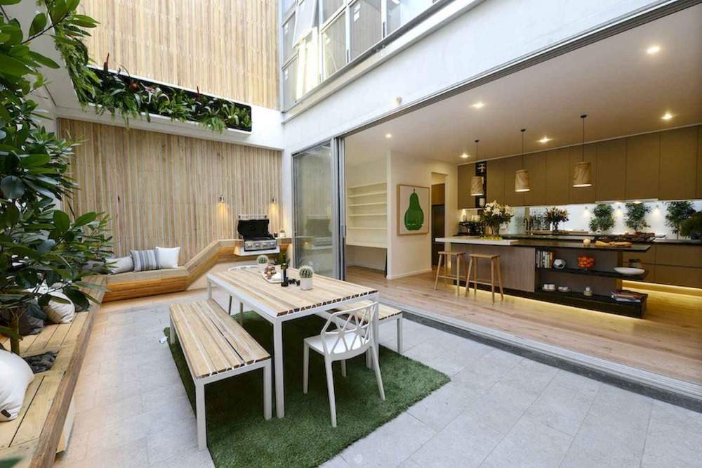 fresh-looking courtyard with kitchen lines and benches