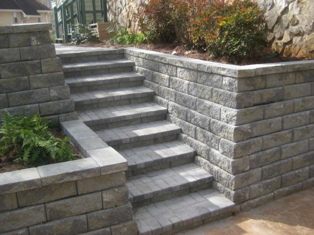 garden stairs on the slope and concrete walls of concrete hardscape