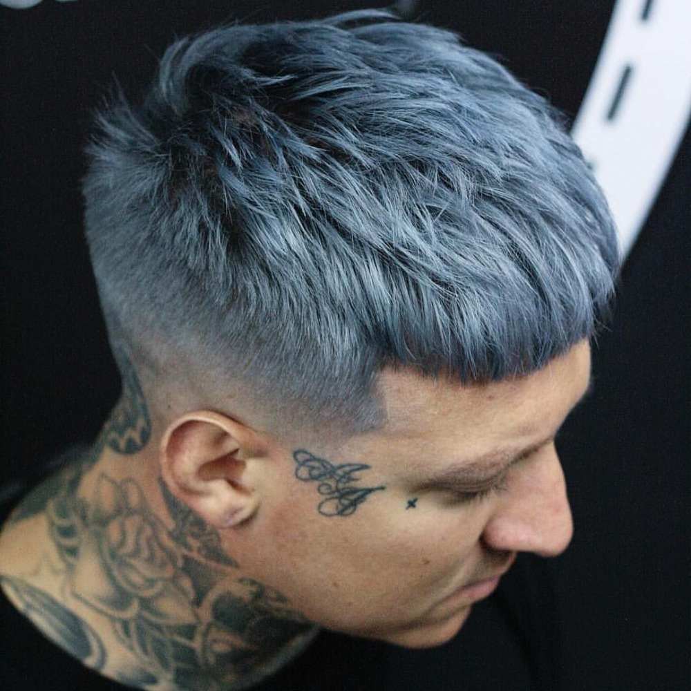 boyish aesthetic look hair gray man with tattoos in the neck