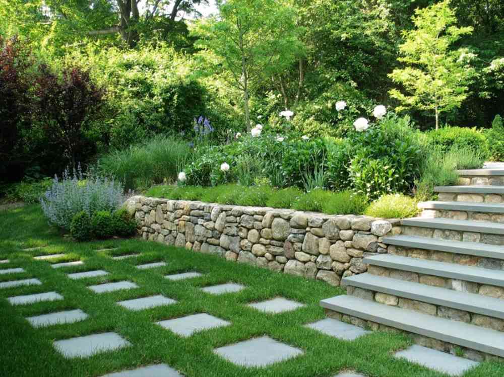 landscape design as a combination of concrete slab suspension and natural stone modern and classic
