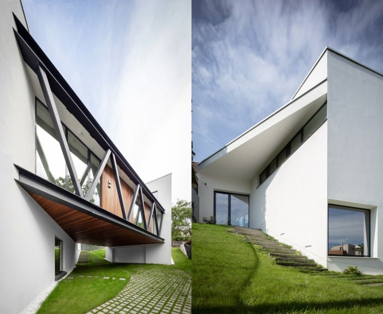 Einfamilienhaus mit weißer Fassade und Holz Details moderne Architektur
