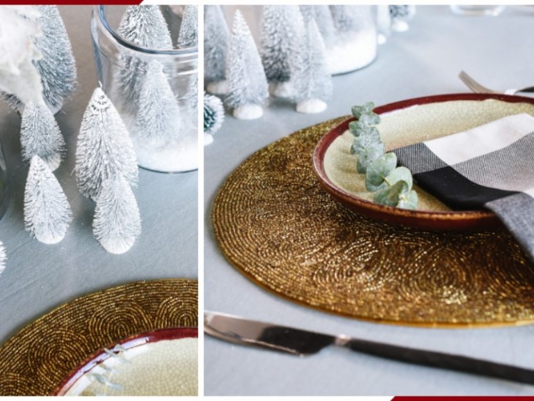 gedeckter Tisch zu Weihnachten mit roten Gerberas mit Kunstschnee und Karo Serviette