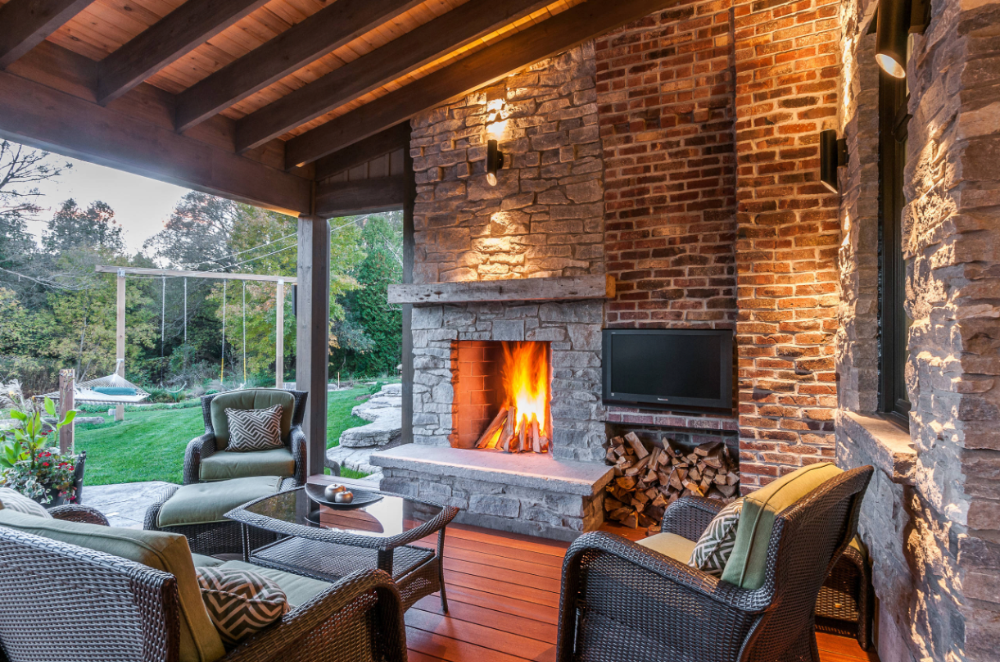 light sources in the outside area over the fireplace as stone wall lighting