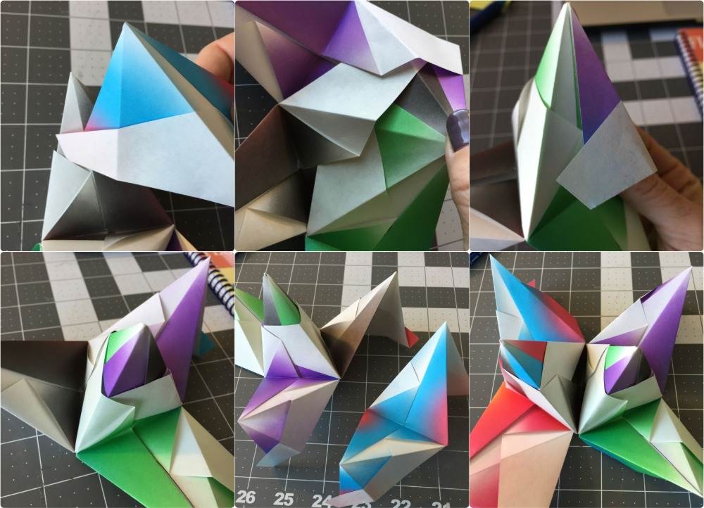 teile eines origami 3d sterns zusammengefügt nach faltanleitung mit farbigem papier