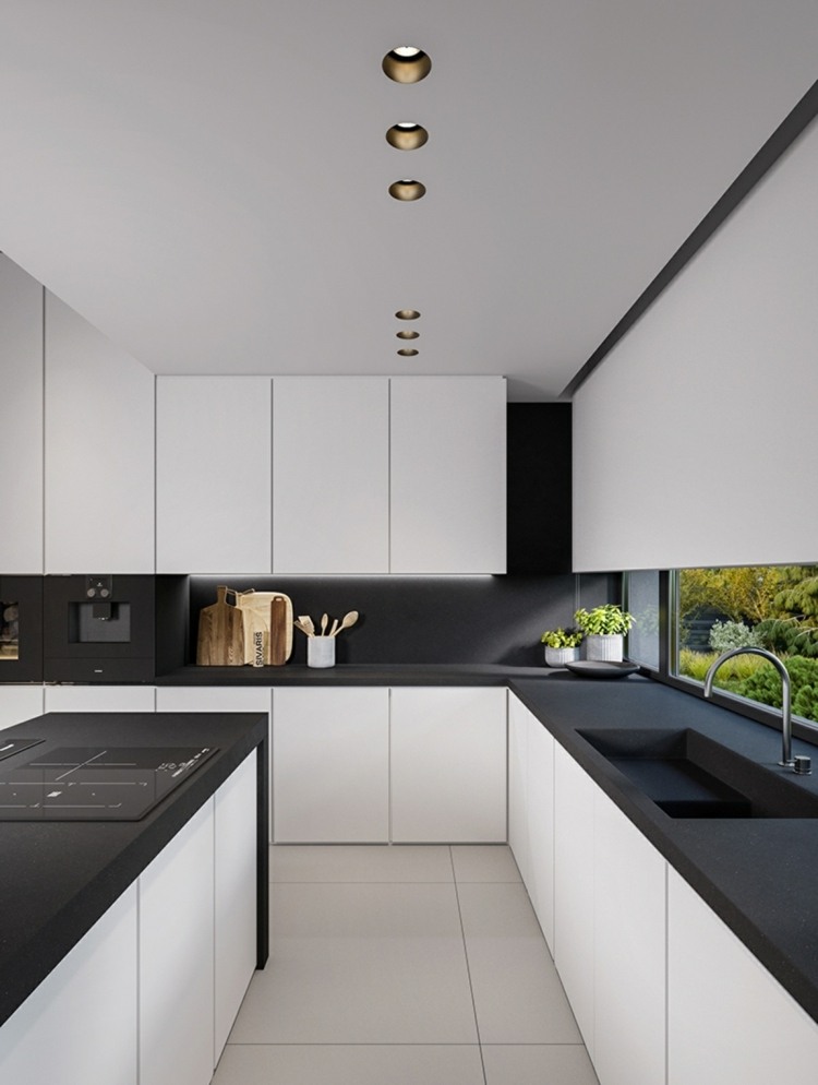 Küche modern einrichten Tipps schwarze Arbeitsplatte reinigen