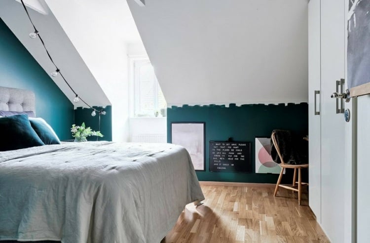 Suggestion for the room for teenagers - petrol as wall color and fairy lights on the slope