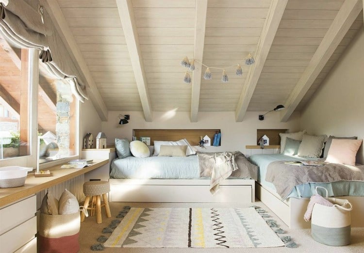 Set up beds under a sloping roof in an L shape - decoration and furnishings in subtle colors