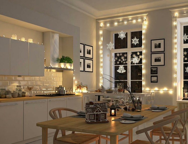 Gestaltung des Fensters mit Lichterketten und Fensterbildern in der Küche für dunkle Winterabende