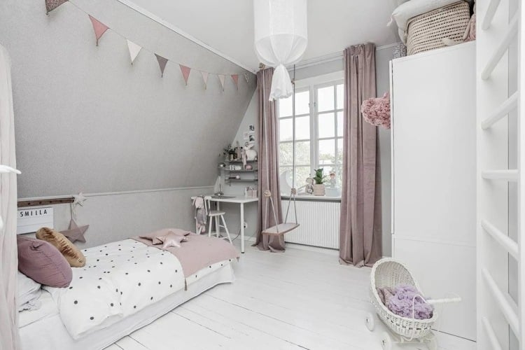 Children's room for girls in ash pink, white and gray with a cozy slant