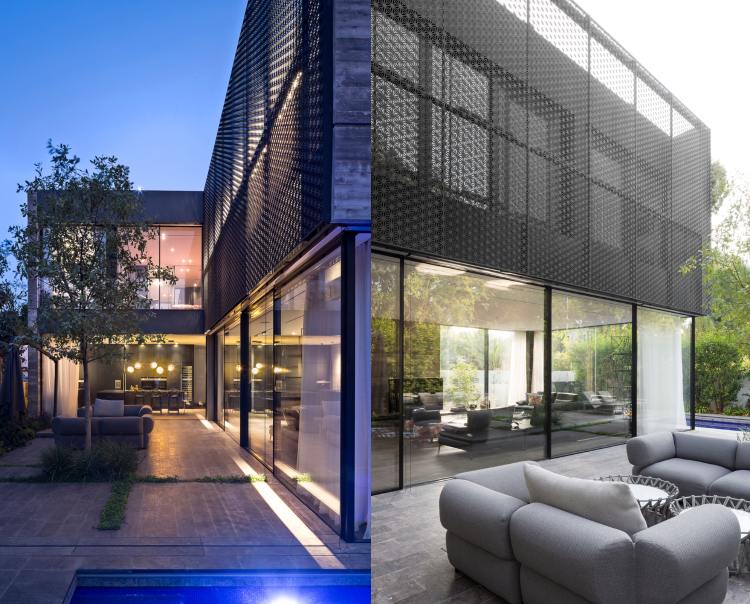 Modernes Haus mit abgehängte Fassade und Verglasung und große Terrasse