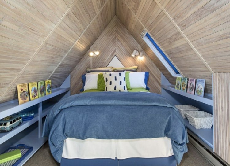 Convert very small attic room into a child's room with built-in shelves